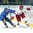 SPISSKA NOVA VES, SLOVAKIA - APRIL 16: Belarus's Andrei Pavlenko #15 and Sweden's Erik Brannstrom #4 chase down a loose puck during preliminary round action at the 2017 IIHF Ice Hockey U18 World Championship. (Photo by Steve Kingsman/HHOF-IIHF Images)

